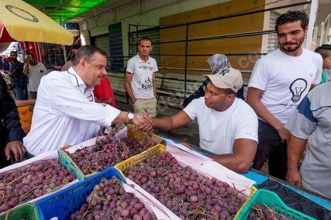 October 16, 2014: Samir Taieb, a member of the National Constituent Assembly (ANC) and the lead candidate on the Tunis 1 list for the Union for Tunisia (UPT) party in the legislative elections, campaigning at the Kabaria market. Kabaria is one of the most disadvantaged neighborhoods in the southern suburbs of Tunis; social tensions and grievances are widespread in these neighborhoods, where residents are often disillusioned with politics. Grassroots outreach has the merit of giving them hope and convincing them to go to the polls. 