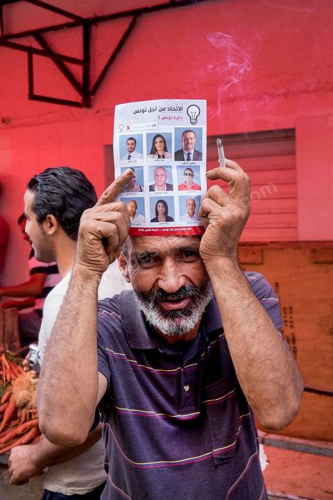 October 16, 2014: Samir Taieb, a member of the National Constituent Assembly (ANC) and the lead candidate on the Tunis 1 list for the Union for Tunisia (UPT) party in the legislative elections, campaigning at the Kabaria market. Kabaria is one of the most disadvantaged neighborhoods in the southern suburbs of Tunis; social tensions and grievances are widespread in these neighborhoods, where residents are often disillusioned with politics. Grassroots outreach has the merit of giving them hope and convincing them to go to the polls. 