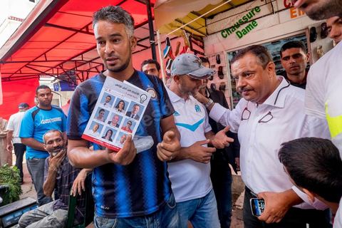 October 16, 2014: Samir Taieb, a member of the National Constituent Assembly (ANC) and the lead candidate on the Tunis 1 list for the Union for Tunisia (UPT) party in the legislative elections, campaigning at the Kabaria market. Kabaria is one of the most disadvantaged neighborhoods in the southern suburbs of Tunis; social tensions and grievances are widespread in these neighborhoods, where residents are often disillusioned with politics. Grassroots outreach has the merit of giving them hope and convincing them to go to the polls. 