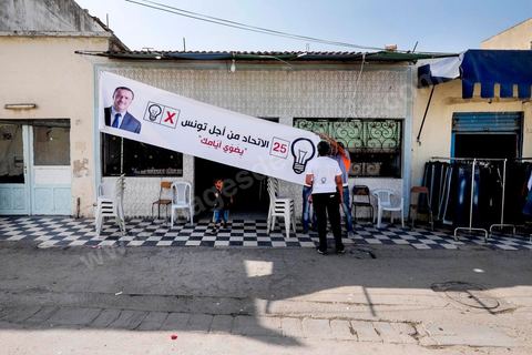 October 16, 2014: Samir Taieb, a member of the National Constituent Assembly (ANC) and the lead candidate on the Tunis 1 list for the Union for Tunisia (UPT) party in the legislative elections, campaigning at the Kabaria market. Kabaria is one of the most disadvantaged neighborhoods in the southern suburbs of Tunis; social tensions and grievances are widespread in these neighborhoods, where residents are often disillusioned with politics. Grassroots outreach has the merit of giving them hope and convincing them to go to the polls. 