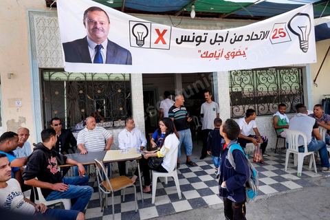 October 16, 2014: Samir Taieb, a member of the National Constituent Assembly (ANC) and the lead candidate on the Tunis 1 list for the Union for Tunisia (UPT) party in the legislative elections, campaigning at the Kabaria market. Kabaria is one of the most disadvantaged neighborhoods in the southern suburbs of Tunis; social tensions and grievances are widespread in these neighborhoods, where residents are often disillusioned with politics. Grassroots outreach has the merit of giving them hope and convincing them to go to the polls. 