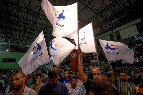 October 17, 2014: Rally held by the Islamist Ennahdha Party in the sports hall of the working-class neighborhood of Ezzouhour, a western suburb of Tunis, to present the “Tunis 1” slate led by Ali Larayedh, former interior minister and prime minister, for the campaign leading up to the October 26 legislative elections. 
