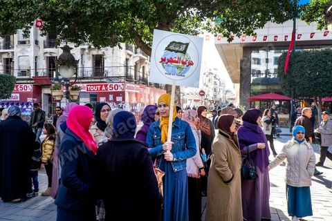 January 14, 2015: The Hezb Ut-Tahrir party, legalized in 2012 by Jebali, even though it does not recognize the concept of a republic. Tunisians celebrated on Habib Bourguiba Avenue in Tunis the fourth anniversary of the Tunisian revolution that led to the fall of ousted President Zine el Abdidine Ben Ali on Friday, January 14, 2011, and his exile to Saudi Arabia. Among the many Tunisians who came to march with their families under a gentle sun, a wide variety of groups were spread out along the avenue: families of martyrs, supporters of Hizb al-Tahrir, Ennahda, or El Watan, the Islamist youth of the LPR, and supporters of Sofiane and Nadhir, ...