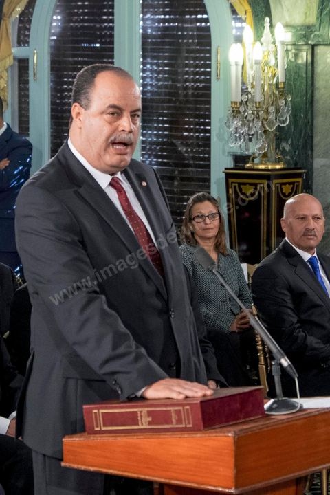 6 février 2015 : Mohamed Najem Gharsalli, ministre de l'intérieur prête serment. deux jours après le vote de confiance du nouveau gouvernement de Habib Essid à l'assemblée avec une large majorité pour de 166 sièges sur 217, cérémonie de pretsation de serment et photo du nouveau gouvernement au Palais de Carthage autour du Président de la République Béji Caïd Essebsi. Les 44 ministres et secrétaires d’Etat choisis par le Chef du gouvernement Habib Essid se sont présentés, chacun son tour, devant le président de la République pour prêter serment sur le Coran.