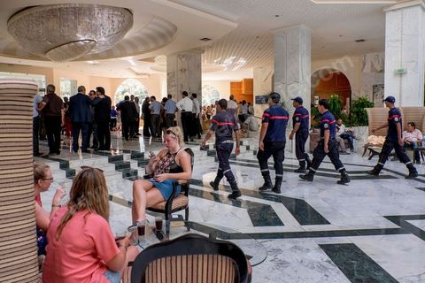 June 26, 2015: In the hotel lobby, police encountered tourists in a state of shock. A terrorist attack took place at a hotel in the Port El Kantaoui tourist area north of Sousse. A young Tunisian terrorist opened fire for nearly half an hour on tourists, from the hotel beach all the way to the front desk, leaving a preliminary death toll of 39 among tourists and Tunisian employees, before being shot dead by law enforcement. The Tunisian Ministry of Health states that among the injured are people of British, Belgian, German, and Norwegian nationalities, among others.