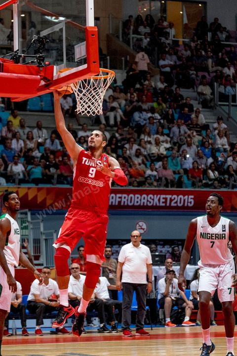 August 23, 2015: Mohamed Hadidane scores a basket during Tunisia’s final group stage game against Nigeria at AfroBasket Tunisia 2015. Tunisia won (70–59) and finished first in its group.