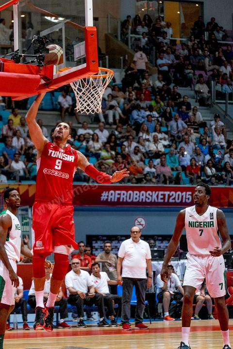 August 23, 2015: Mohamed Hadidane scores a basket during Tunisia’s final group stage game against Nigeria at AfroBasket Tunisia 2015. Tunisia won (70–59) and finished first in its group.