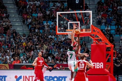 August 23, 2015: Salah Mejri, Tunisia’s famous No. 15, dominates the game at 2.17m; he has just been signed by the Dallas Mavericks and becomes the first Arab player in the NBA. Tunisia’s final group stage game against Nigeria at AfroBasket Tunisia 2015. Tunisia won (70–59) and finished first in its group.