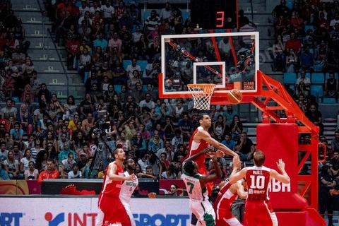 August 23, 2015: Salah Mejri, Tunisia’s famous No. 15, dominates the game at 2.17m; he has just been signed by the Dallas Mavericks and becomes the first Arab player in the NBA. Tunisia’s final group stage game against Nigeria at AfroBasket Tunisia 2015. Tunisia won (70–59) and finished first in its group.