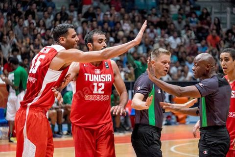 August 23, 2015: Salah Mejri, Tunisia’s famous No. 15, dominates the game at 2.17m; he has just been signed by the Dallas Mavericks and becomes the first Arab player in the NBA. Tunisia’s final group stage game against Nigeria at AfroBasket Tunisia 2015. Tunisia won (70–59) and finished first in its group.