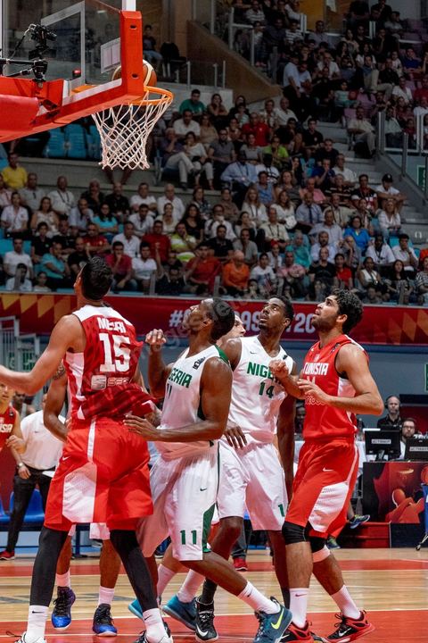 August 23, 2015: Salah Mejri, Tunisia’s famous No. 15, dominates the game at 2.17m; he has just been signed by the Dallas Mavericks and becomes the first Arab player in the NBA. Tunisia’s final group stage game against Nigeria at AfroBasket Tunisia 2015. Tunisia won (70–59) and finished first in its group.