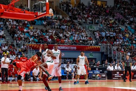 August 23, 2015: Hamdi Braa scores a basket during Tunisia's final group-stage game against Nigeria at AfroBasket Tunisia 2015. Tunisia won (70-59) and finished first in its group.