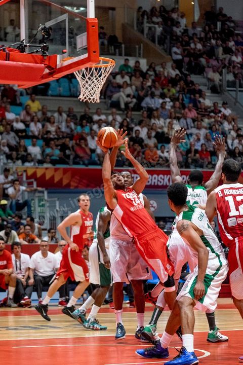 August 23, 2015: Hamdi Braa scores a basket during Tunisia's final group-stage game against Nigeria at AfroBasket Tunisia 2015. Tunisia won (70-59) and finished first in its group.