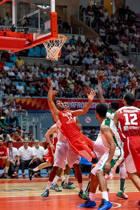 August 23, 2015: Hamdi Braa scores a basket during Tunisia's final group-stage game against Nigeria at AfroBasket Tunisia 2015. Tunisia won (70-59) and finished first in its group.