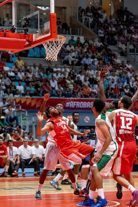 August 23, 2015: Hamdi Braa scores a basket during Tunisia's final group-stage game against Nigeria at AfroBasket Tunisia 2015. Tunisia won (70-59) and finished first in its group.