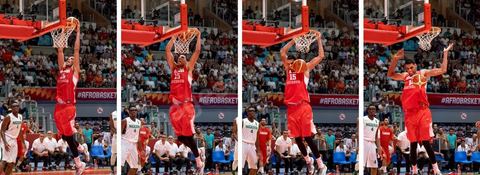 August 23, 2015: Salah Mejri, Tunisia’s famous No. 15, dominates the game at 2.17m; he has just been signed by the Dallas Mavericks and becomes the first Arab player in the NBA. Tunisia’s final group stage game against Nigeria at AfroBasket Tunisia 2015. Tunisia won (70–59) and finished first in its group.