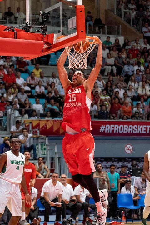 August 23, 2015: Salah Mejri, Tunisia’s famous No. 15, dominates the game at 2.17m; he has just been signed by the Dallas Mavericks and becomes the first Arab player in the NBA. Tunisia’s final group stage game against Nigeria at AfroBasket Tunisia 2015. Tunisia won (70–59) and finished first in its group.