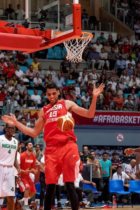 August 23, 2015: Salah Mejri, Tunisia’s famous No. 15, dominates the game at 2.17m; he has just been signed by the Dallas Mavericks and becomes the first Arab player in the NBA. Tunisia’s final group stage game against Nigeria at AfroBasket Tunisia 2015. Tunisia won (70–59) and finished first in its group.