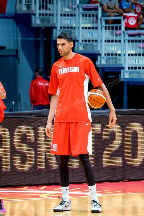 August 23, 2015: Salah Mejri, Tunisia’s famous No. 15, dominates the game at 2.17m; he has just been signed by the Dallas Mavericks and becomes the first Arab player in the NBA. Tunisia’s final group stage game against Nigeria at AfroBasket Tunisia 2015. Tunisia won (70–59) and finished first in its group.