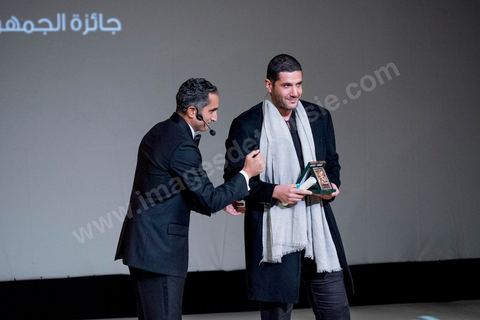 November 28, 2015: Bassem Youssef, the master of ceremonies, presented Nabil Ayouch with the Audience Award for his film "Much Loved." The closing ceremony of the JCC took place at the Municipal Theater of Tunis, in the heart of the capital, which had been devastated just a few days earlier by a suicide terrorist attack that killed 12 members of the presidential guard. The ceremony, moved up due to a curfew, served as a tribute to the culture that had stood up to terror throughout the week and provided an opportunity to honor artists and filmmakers from the Arab-African world. 