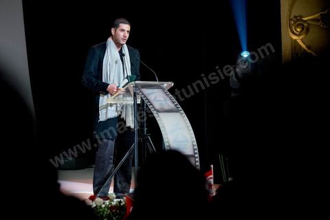 28 novembre 2015 : Nabil Ayouch a reçu le Prix du Public pour son film "Much Loved". Cérémonie de cloture des JCC au théâtre municipal de Tunis au coeur de la capitale meutrie il y a quelques jours à peine par une attaque suicide terroriste qui a fait 12 morts parmis les policiers de la garde présidentielle. La cérémonie avancée pour cause de couvre feu a été un moment d'hommage à la culture qui a su faire face à la terreur durant cette semaine et l'occasion de primée les artistes et réalisateur du monde arabo-africain. 