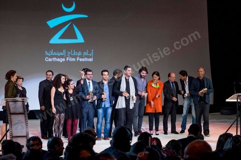 November 28, 2015: Family photos of all the award winners. The closing ceremony of the JCC took place at the Municipal Theater of Tunis, in the heart of the capital, which had been devastated just a few days earlier by a suicide terrorist attack that killed 12 members of the Presidential Guard. The ceremony, moved up due to a curfew, was a moment to pay tribute to the culture that stood up to terror throughout the week and an opportunity to honor artists and filmmakers from the Arab-African world. 