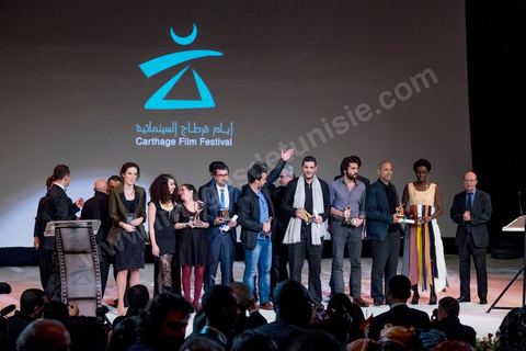 November 28, 2015: Family photos of all the award winners. The closing ceremony of the JCC took place at the Municipal Theater of Tunis, in the heart of the capital, which had been devastated just a few days earlier by a suicide terrorist attack that killed 12 members of the Presidential Guard. The ceremony, moved up due to a curfew, was a moment to pay tribute to the culture that stood up to terror throughout the week and an opportunity to honor artists and filmmakers from the Arab-African world. 