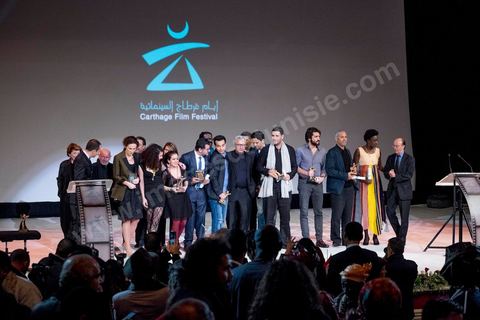 November 28, 2015: Family photos of all the award winners. The closing ceremony of the JCC took place at the Municipal Theater of Tunis, in the heart of the capital, which had been devastated just a few days earlier by a suicide terrorist attack that killed 12 members of the Presidential Guard. The ceremony, moved up due to a curfew, was a moment to pay tribute to the culture that stood up to terror throughout the week and an opportunity to honor artists and filmmakers from the Arab-African world. 
