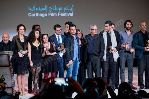 November 28, 2015: Family photos of all the award winners. The closing ceremony of the JCC took place at the Municipal Theater of Tunis, in the heart of the capital, which had been devastated just a few days earlier by a suicide terrorist attack that killed 12 members of the Presidential Guard. The ceremony, moved up due to a curfew, was a moment to pay tribute to the culture that stood up to terror throughout the week and an opportunity to honor artists and filmmakers from the Arab-African world. 