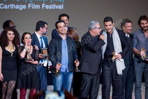 November 28, 2015: Family photos of all the award winners. The closing ceremony of the JCC took place at the Municipal Theater of Tunis, in the heart of the capital, which had been devastated just a few days earlier by a suicide terrorist attack that killed 12 members of the Presidential Guard. The ceremony, moved up due to a curfew, was a moment to pay tribute to the culture that stood up to terror throughout the week and an opportunity to honor artists and filmmakers from the Arab-African world. 