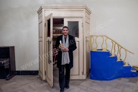 November 28, 2015: Behind the scenes at the theater with Nabil Ayouch and his Jury Prize. The closing ceremony of the JCC took place at the Municipal Theater of Tunis, in the heart of the capital, which had been devastated just a few days earlier by a suicide terrorist attack that killed 12 members of the presidential guard. The ceremony, moved up due to a curfew, served as a tribute to the culture that stood up to terror throughout the week and provided an opportunity to honor artists and filmmakers from the Arab-African world. 