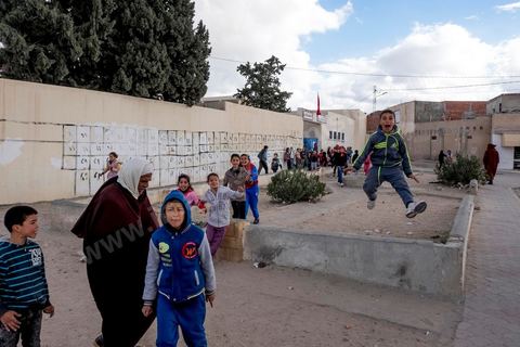 January 22, 2016, in front of the elementary school in the working-class neighborhood of Cité Ezzouhour in Kasserine.