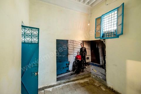 October 4, 2017: Dream City in the Medina of Tunis. Exhibition and installation by visual artist Héla Ammar titled “A contre-jour” (Backlit): in photography, backlighting occurs when light strikes the subject from the side opposite the direction in which the viewer is looking; the subject’s features then fade into the background, giving way to its surroundings.It is through this factual illumination that the story shared today by a large portion of our youth begins. This semi-darkness, where the subject fades into the background in favor of the violence and precariousness of their environment, must nevertheless give way to another light—the light that each of these young people carries within themselves as individuals.