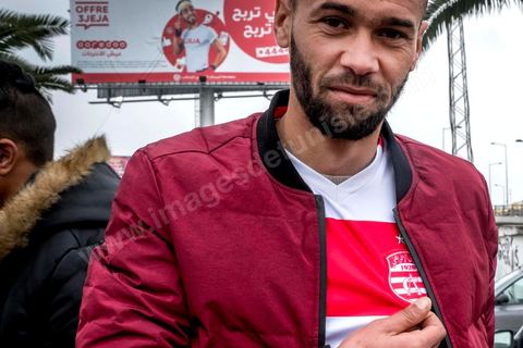 February 18, 2018: Some fans come from the other side of the country; here is a Club Africain fan from Redeyef, a mining town 500 km from Tunis. In Tunis, it’s the big day—the soccer derby, the match between the league’s two current top teams and Tunis’s two flagship clubs, Club Africain (CA) versus Espérance de Tunis (EST), at the Radès Stadium in the southern suburbs of Tunis. This rematch favors CA, which controls ticket sales. Given the numerous clashes between fans and ultra groups in the stadiums—both among themselves and with the police— only 23,000 tickets are being sold (out of a capacity of 60,000), including 1,200 for EST—though only about 50 of those will be allocated to the south stand. The match will end with a surprise 2–1 victory for CA. 