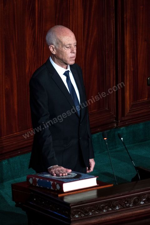 October 23, 2019: Kais Saied, the new president of the republic elected on October 13, arrived at the Assembly of the Representatives of the People to take the oath of office and deliver a speech. Before a packed chamber—including members of parliament, government officials, political figures, and ambassadors— Kais Saied declared that Tunisia had carried out a “true revolution, in a new sense of the word, because revolutions are generally waged against legitimacy, but what happened in Tunisia was a true revolution that utilized the very tools of legitimacy themselves.” In his view, “everyone here bears a responsibility—the responsibility to respond to the people in their demand for freedom and dignity. The wait has been all too long, and no one has the right to disappoint them.”