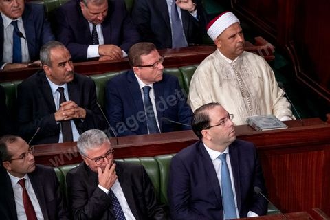 October 23, 2019: Kais Saied, the new president of the republic elected on October 13, arrived at the Assembly of the Representatives of the People to take the oath of office and deliver a speech. Before a packed chamber—including members of parliament, government officials, political figures, and ambassadors— Kais Saied declared that Tunisia had carried out a “true revolution, in a new sense of the word, because revolutions are generally waged against legitimacy, but what happened in Tunisia was a true revolution that utilized the very tools of legitimacy themselves.” In his view, “everyone here bears a responsibility—the responsibility to respond to the people in their demand for freedom and dignity. The wait has been all too long, and no one has the right to disappoint them.”