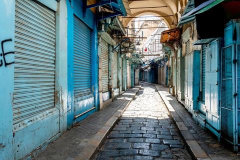 April 4, 2020: The Medina of Tunis is deserted. Jamaa Ez Zitouna Street, the main thoroughfare of the Medina of Tunis and a popular tourist street, is empty, with all the shops closed during the government-imposed lockdown due to COVID-19. A curfew was also in effect during this period, from 6:00 p.m. until 6:00 a.m. 