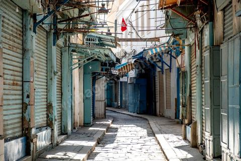 April 4, 2020: The Medina of Tunis is deserted. Jamaa Ez Zitouna Street, the main thoroughfare of the Medina of Tunis and a popular tourist street, is empty, with all the shops closed during the government-imposed lockdown due to COVID-19. A curfew was also in effect during this period, from 6:00 p.m. until 6:00 a.m. 