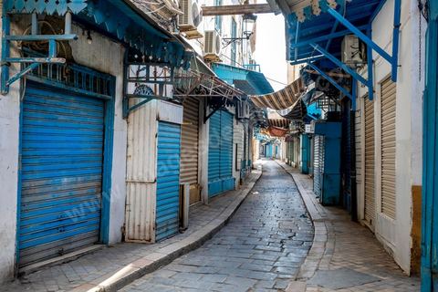 April 4, 2020: The Medina of Tunis is deserted. Jamaa Ez Zitouna Street, the main thoroughfare of the Medina of Tunis and a popular tourist street, is empty, with all the shops closed during the government-imposed lockdown due to COVID-19. A curfew was also in effect during this period, from 6:00 p.m. until 6:00 a.m. 