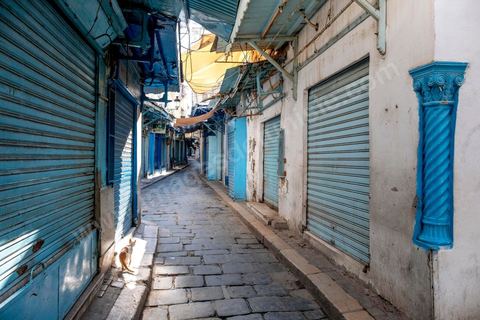 April 4, 2020: The Medina of Tunis is deserted. Jamaa Ez Zitouna Street, the main thoroughfare of the Medina of Tunis and a popular tourist street, is empty, with all the shops closed during the government-imposed lockdown due to COVID-19. A curfew was also in effect during this period, from 6:00 p.m. until 6:00 a.m. 