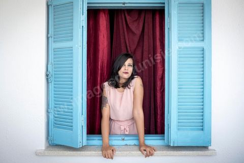 July 12, 2020: Profile of Emna Charki, a young Tunisian blogger facing legal charges for a Facebook post deemed to constitute “incitement to hatred between religions and a call for discrimination”; she faces up to three years in prison, with the verdict set for July 13. Here in her apartment while she’s in the process of moving—her landlord refusing to house a “kafir” (“unbeliever”)—she proudly displays her 2012 tattoo that reads “out law” (“outlaw”). On July 14, she was sentenced to six months in prison without parole for inciting hatred between religions and fined 2,000 dinars (€620) for desecration of the sacred. Her lawyers have filed an appeal. 