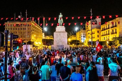 July 25, 2021: Following the broadcast of Kais Saied’s statement, several thousand Tunisians took to the streets to celebrate what appears to be a “constitutional coup” and to welcome the military personnel who had taken up positions at the top of Habib Bourguiba Avenue in Tunis.  President Kaïs Saïed convened an emergency meeting this evening with security and military leaders and senior officials, during which he announced several decisions “in accordance with the Constitution,” the main ones being the suspension of Parliament and all its activities, the dismissal of the head of government, the dissolution of the government, and the President of the Republic will appoint a new head of government and members of the government...