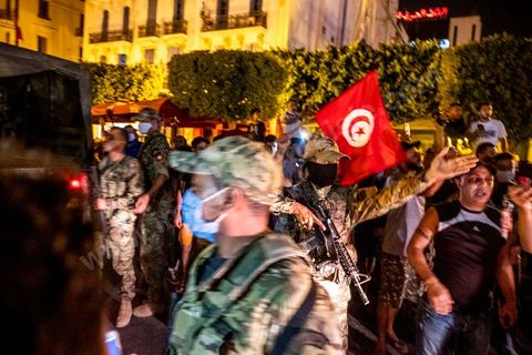 July 25, 2021: Following the broadcast of Kais Saied’s statement, several thousand Tunisians took to the streets to celebrate what appears to be a “constitutional coup” and to welcome the military personnel who had taken up positions at the top of Habib Bourguiba Avenue in Tunis.  President Kaïs Saïed convened an emergency meeting this evening with security and military leaders and senior officials, during which he announced several decisions “in accordance with the Constitution,” the main ones being the suspension of Parliament and all its activities, the dismissal of the head of government, the dissolution of the government, and the President of the Republic will appoint a new head of government and members of the government...