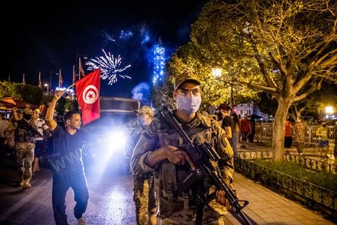 July 25, 2021: Following the broadcast of Kais Saied’s statement, several thousand Tunisians took to the streets to celebrate what appears to be a “constitutional coup” and to welcome the military personnel who had taken up positions at the top of Habib Bourguiba Avenue in Tunis.  President Kaïs Saïed convened an emergency meeting this evening with security and military leaders and senior officials, during which he announced several decisions “in accordance with the Constitution,” the main ones being the suspension of Parliament and all its activities, the dismissal of the head of government, the dissolution of the government, and the President of the Republic will appoint a new head of government and members of the government...