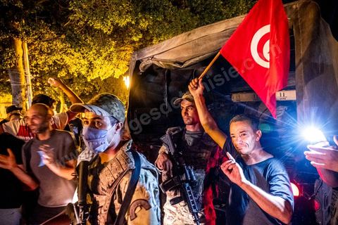 July 25, 2021: Following the broadcast of Kais Saied’s statement, several thousand Tunisians took to the streets to celebrate what appears to be a “constitutional coup” and to welcome the military personnel who had taken up positions at the top of Habib Bourguiba Avenue in Tunis.  President Kaïs Saïed convened an emergency meeting this evening with security and military leaders and senior officials, during which he announced several decisions “in accordance with the Constitution,” the main ones being the suspension of Parliament and all its activities, the dismissal of the head of government, the dissolution of the government, and the President of the Republic will appoint a new head of government and members of the government...