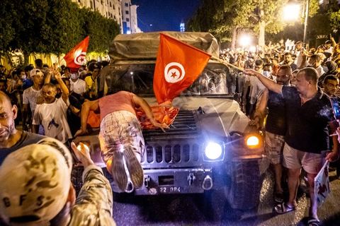 July 25, 2021: Following the broadcast of Kais Saied’s statement, several thousand Tunisians took to the streets to celebrate what appears to be a “constitutional coup” and to welcome the military personnel who had taken up positions at the top of Habib Bourguiba Avenue in Tunis.  President Kaïs Saïed convened an emergency meeting this evening with security and military leaders and senior officials, during which he announced several decisions “in accordance with the Constitution,” the main ones being the suspension of Parliament and all its activities, the dismissal of the head of government, the dissolution of the government, and the President of the Republic will appoint a new head of government and members of the government...