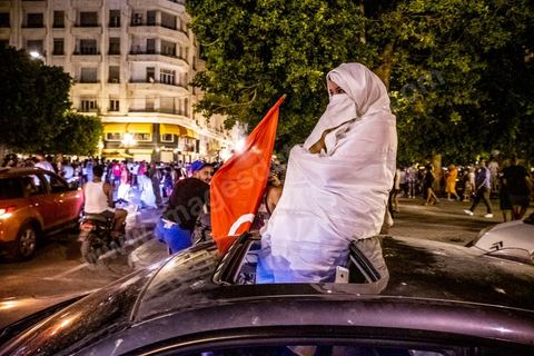 July 25, 2021: Following the broadcast of Kais Saied’s statement, several thousand Tunisians took to the streets to celebrate what appears to be a “constitutional coup” and to welcome the military personnel who had taken up positions at the top of Habib Bourguiba Avenue in Tunis.  President Kaïs Saïed convened an emergency meeting this evening with security and military leaders and senior officials, during which he announced several decisions “in accordance with the Constitution,” the main ones being the suspension of Parliament and all its activities, the dismissal of the head of government, the dissolution of the government, and the President of the Republic will appoint a new head of government and members of the government...