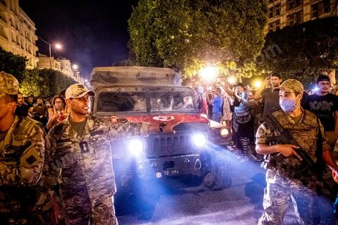 July 25, 2021: Following the broadcast of Kais Saied’s statement, several thousand Tunisians took to the streets to celebrate what appears to be a “constitutional coup” and to welcome the military personnel who had taken up positions at the top of Habib Bourguiba Avenue in Tunis.  President Kaïs Saïed convened an emergency meeting this evening with security and military leaders and senior officials, during which he announced several decisions “in accordance with the Constitution,” the main ones being the suspension of Parliament and all its activities, the dismissal of the head of government, the dissolution of the government, and the President of the Republic will appoint a new head of government and members of the government...