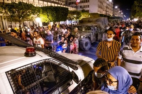 July 25, 2021: Following the broadcast of Kais Saied’s statement, several thousand Tunisians took to the streets to celebrate what appears to be a “constitutional coup” and to welcome the military personnel who had taken up positions at the top of Habib Bourguiba Avenue in Tunis.  President Kaïs Saïed convened an emergency meeting this evening with security and military leaders and senior officials, during which he announced several decisions “in accordance with the Constitution,” the main ones being the suspension of Parliament and all its activities, the dismissal of the head of government, the dissolution of the government, and the President of the Republic will appoint a new head of government and members of the government...