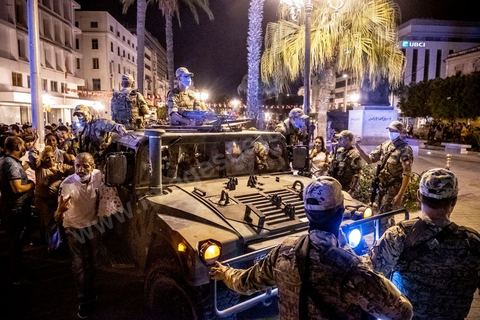 July 25, 2021: Following the broadcast of Kais Saied’s statement, several thousand Tunisians took to the streets to celebrate what appears to be a “constitutional coup” and to welcome the military personnel who had taken up positions at the top of Habib Bourguiba Avenue in Tunis.  President Kaïs Saïed convened an emergency meeting this evening with security and military leaders and senior officials, during which he announced several decisions “in accordance with the Constitution,” the main ones being the suspension of Parliament and all its activities, the dismissal of the head of government, the dissolution of the government, and the President of the Republic will appoint a new head of government and members of the government...